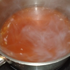 Ajouter le fond de veau, le concentré de tomates, bien mélanger et faire réduire à nouveau doucement. 2. Add concentrated tomato,veal stoke, stir very well, and reduce until it well coats on spoon.